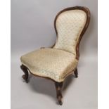19th C. walnut and upholstered chair.