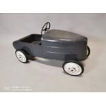 Early 20th. C. metal pedal car.