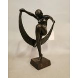 Bronze figurine of a lady.