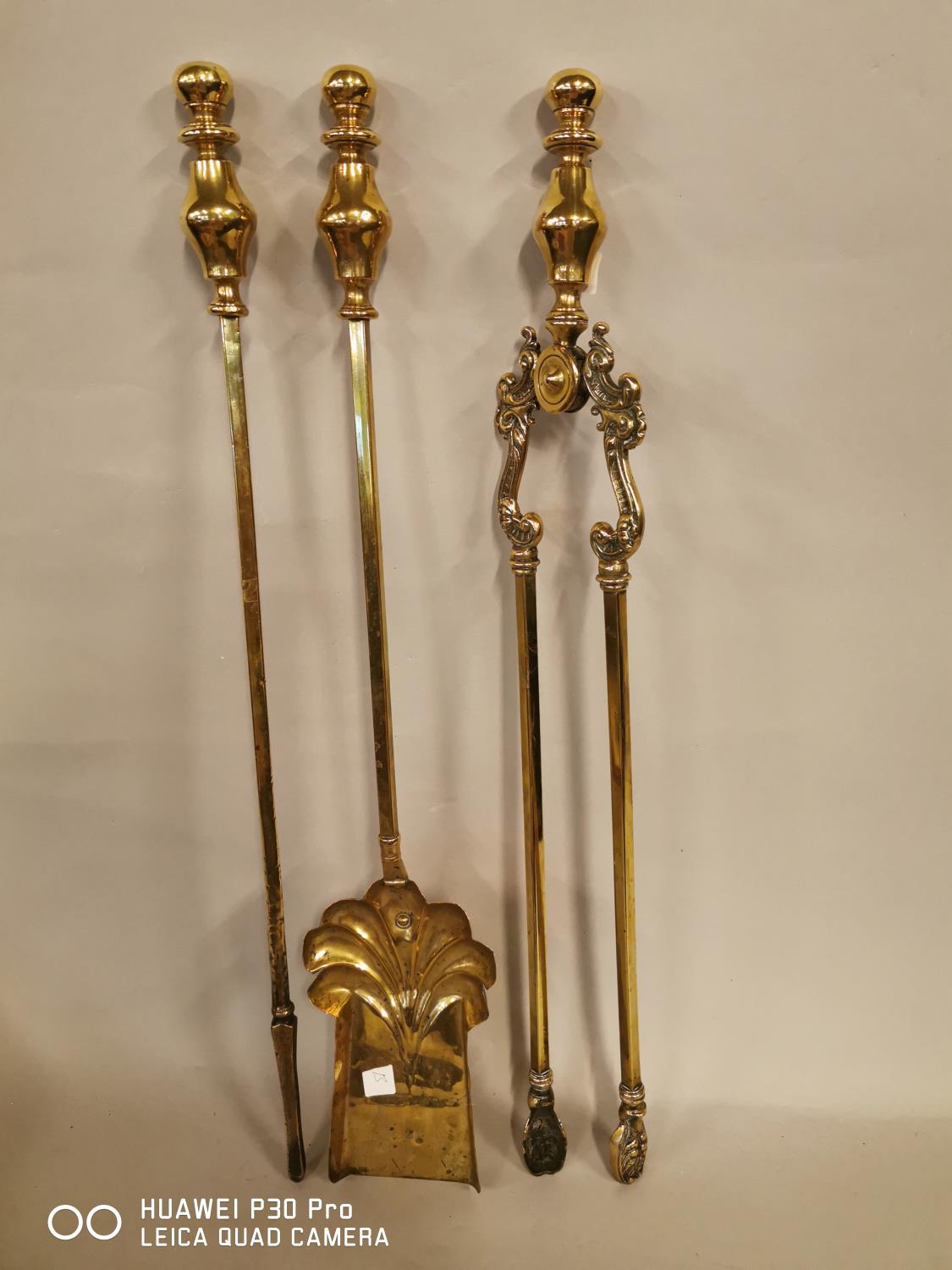 Set of three brass fire irons.