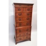 Edwardian flame mahogany chest on chest.