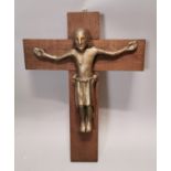 Contemporary crucifix on an oak cross.