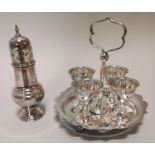 Silverplate condiment set and sugar shaker.