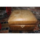 Leather upholstered ottoman