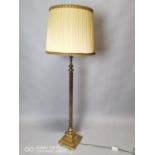 Brass Corinthian column standard lamp.