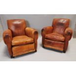 Pair of 1940's leather club chairs.