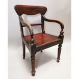 19th C. mahogany open armchair.