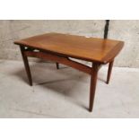 Mid-century teak and rosewood coffee table.