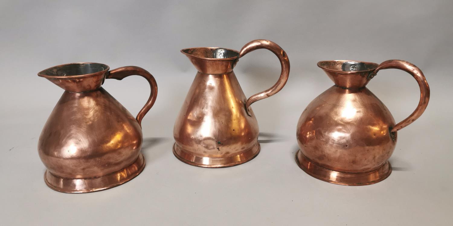 Three early 19th C. copper hay stack measures.