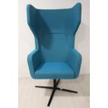 Swivel wing backed chair