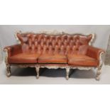 Vintage leather three seater sofa.