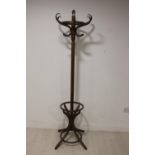 Mahogany four branch hat and coat stand.