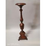 Mahogany candlestick.