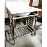 Contemporary chrome and marble wash stand.