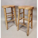Pair of scrubbed pine stools.