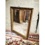 Giltwood and gesso wall mirror.