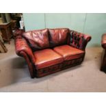Pair of Oxford leather Chesterfield sofas.