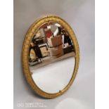 19th C. gilt and bevelled wall mirror.