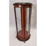 Circular inlaid mahogany display cabinet.