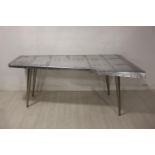 White metal aviator table.