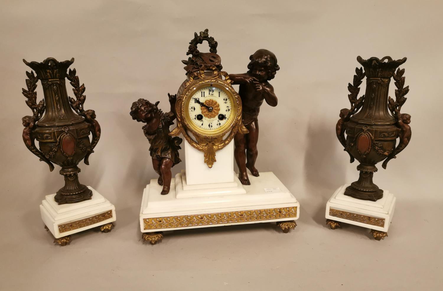 19th C. spelter and marble clock garniture.