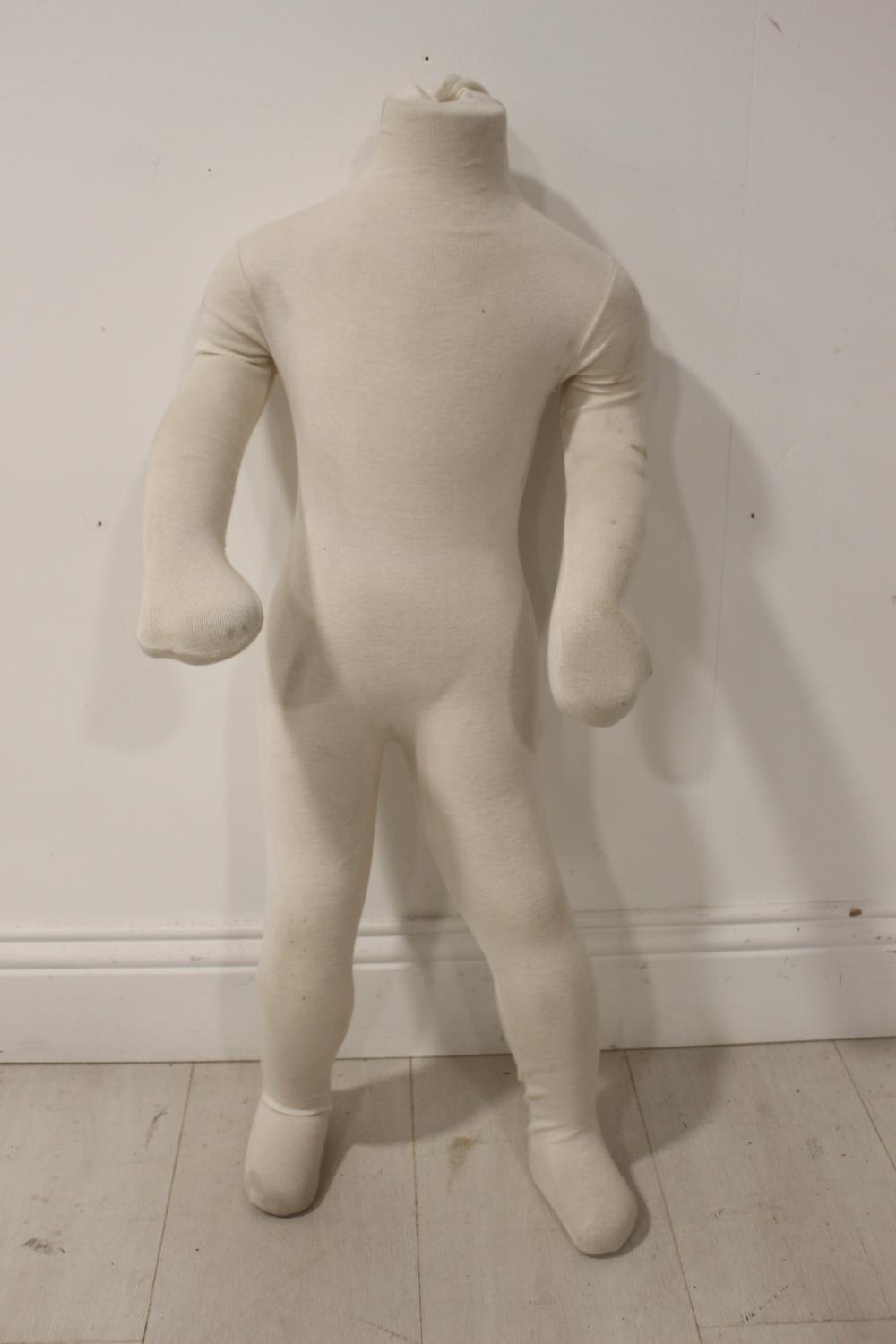 Poseable mannequin in the form of a child.