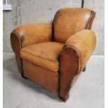 1940s tanned leather club chair.