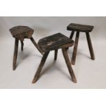 Set of three 18th C. pine three legged stools.