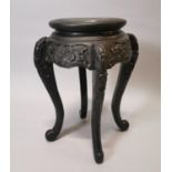 Carved wooden Oriental jardinière stand.