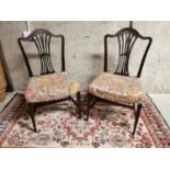 Pair of Edwardian mahogany sidechairs.