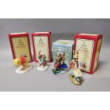 Four Royal Doulton figures.