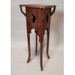 Edwardian mahogany jardinière stand.