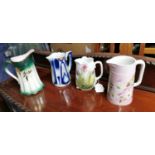 Collection of four ceramic water jugs.