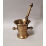 Brass mortar and pestle.
