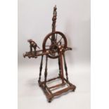 19th C. oak spinning wheel.