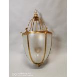 Brass lantern with etched glass panels.