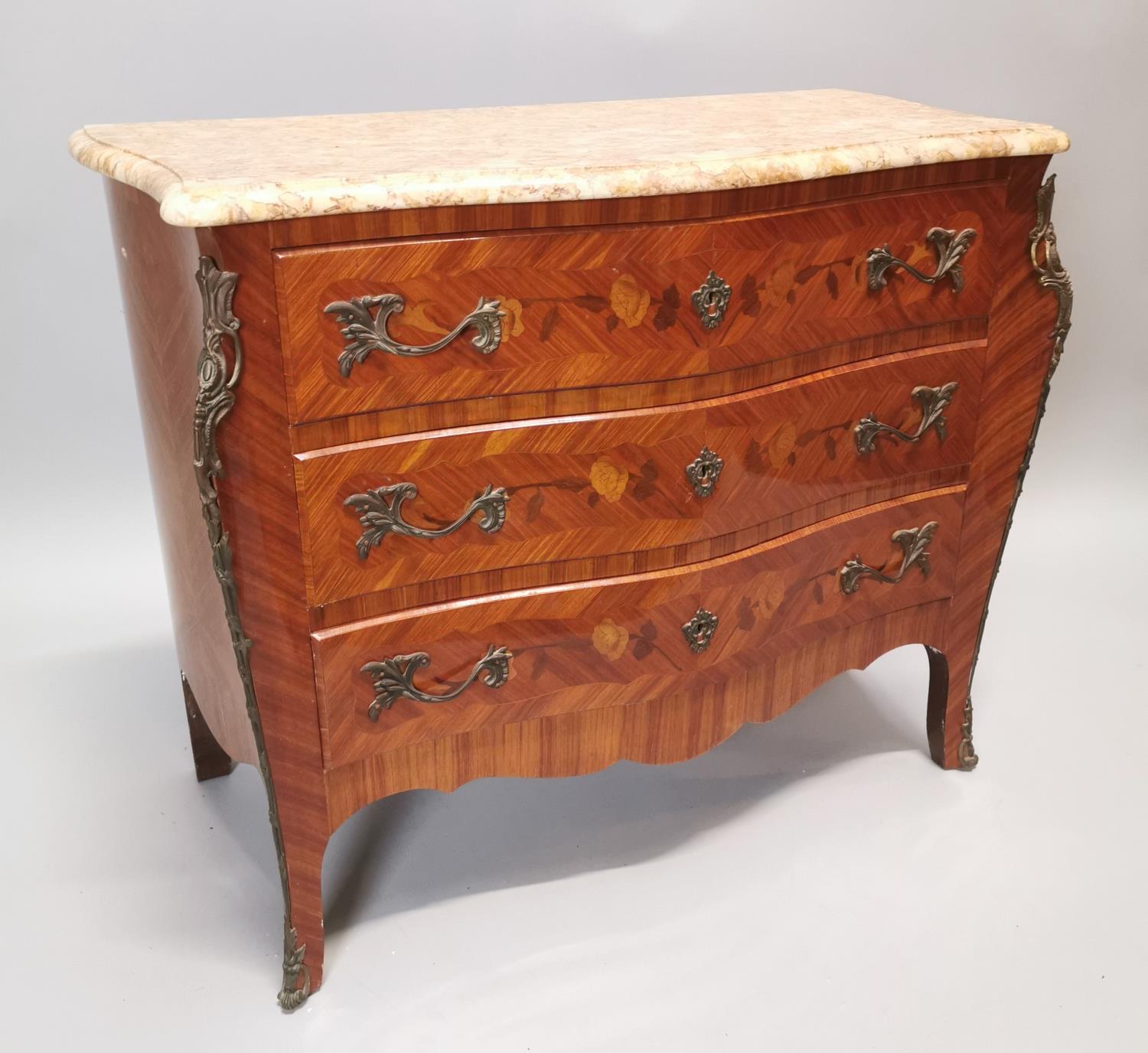 French kingwood and inlaid commode.