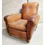 1940s tanned leather club chair.