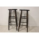 Pair of wooden high stools.