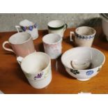 Collection of six spongeware mugs and bowl.