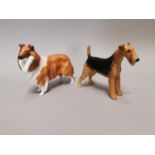 Two ceramic models of Dogs.