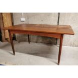 Mid-century teak dining table.