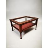 Mahogany table top display cabinet.