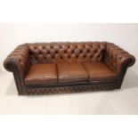 Leather chesterfield sofa.