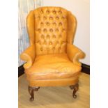 Leather upholstered arm chair.