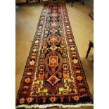 Hand knotted Persian runner.