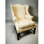 Wingback upholstered chair.