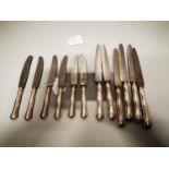 Set of twelve German silver handled knives