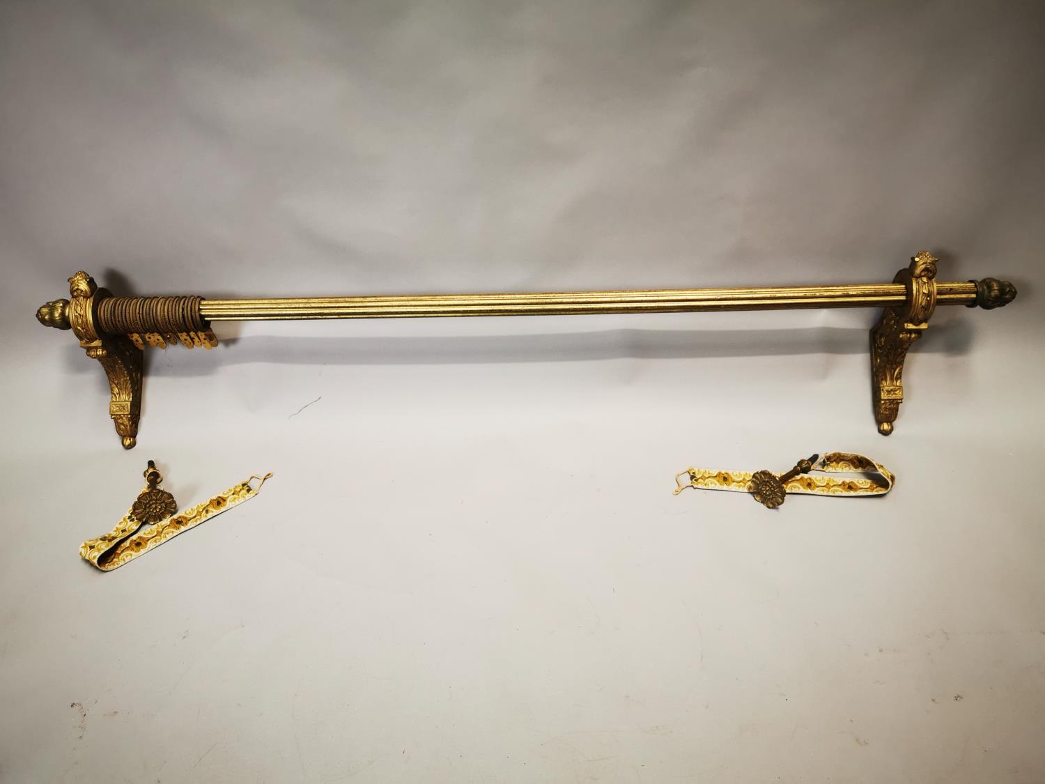 19th C. gilded brass and metal curtain pole.
