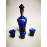 Early 20th etched blue glass decanter.